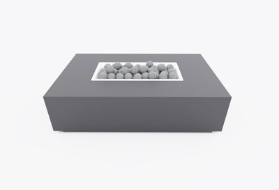 Rectangular concrete fire pit table with lit flame and ceramic spheres, front view