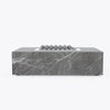 Rectangular OuterStone fire pit table in gray marbled stone with lava rocks, front view