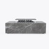 Rectangular OuterStone fire pit table in gray marbled stone with cast iron griddles fitted over the burner