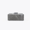Square OuterStone fire pit table in marbled stone with lava rocks, front view