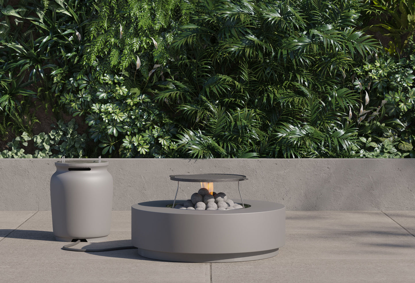 Round concrete fire pit table on a patio beside its cylindrical propane tank cover