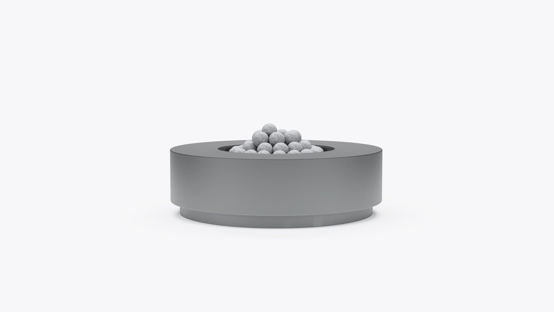Round concrete fire pit table in gray finish with lava rocks, front view