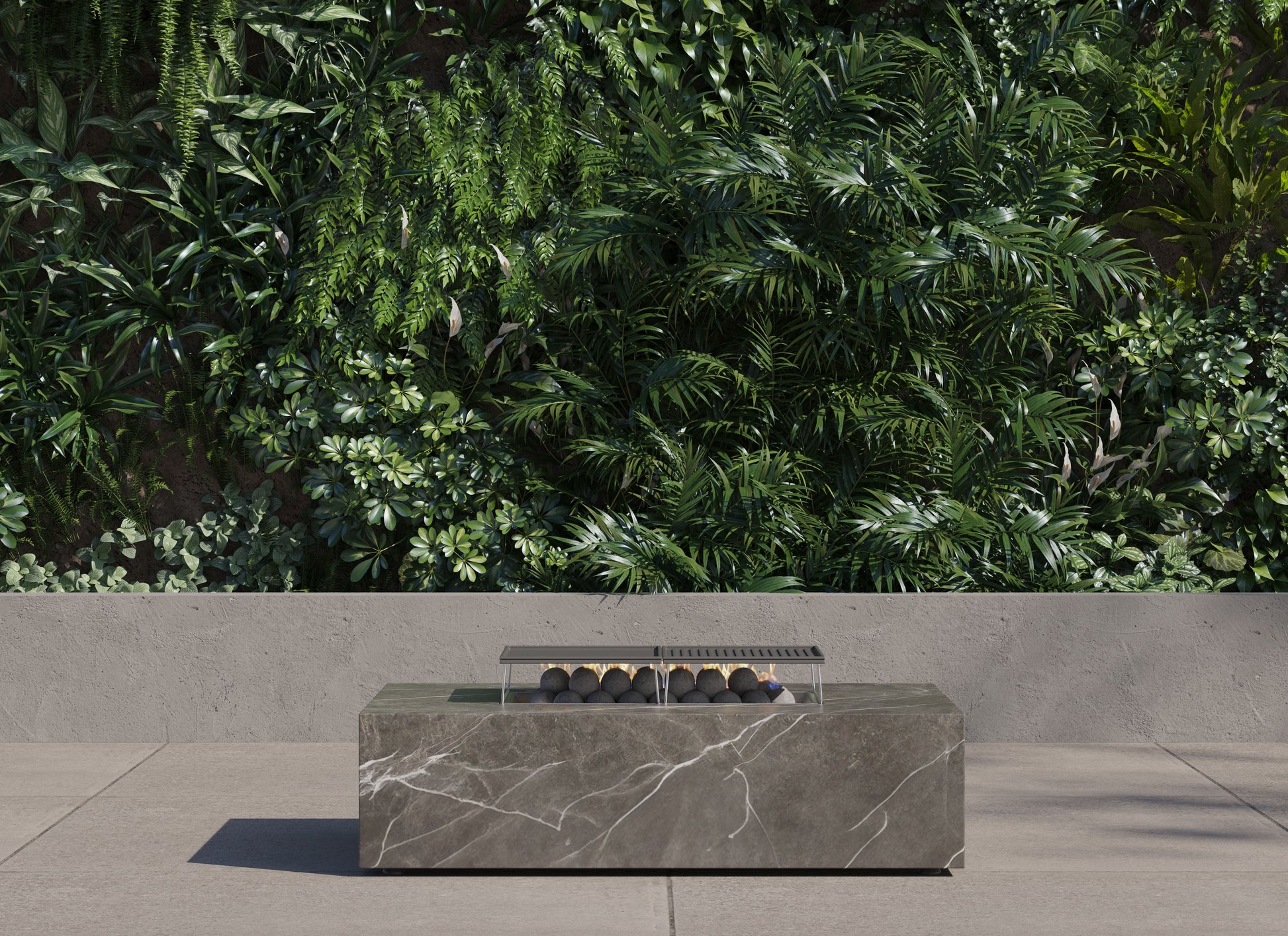 OuterStone rectangular fire pit table with cooking set on a patio at dusk