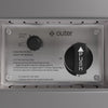 Close-up of the electronic ignition control knob on the concrete face plate