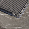 Close-up of the cast iron griddle and stand positioned over the OuterStone burner pan